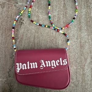 Mini crash crossbody bag in raspberry pink with “palm angels” logo printed